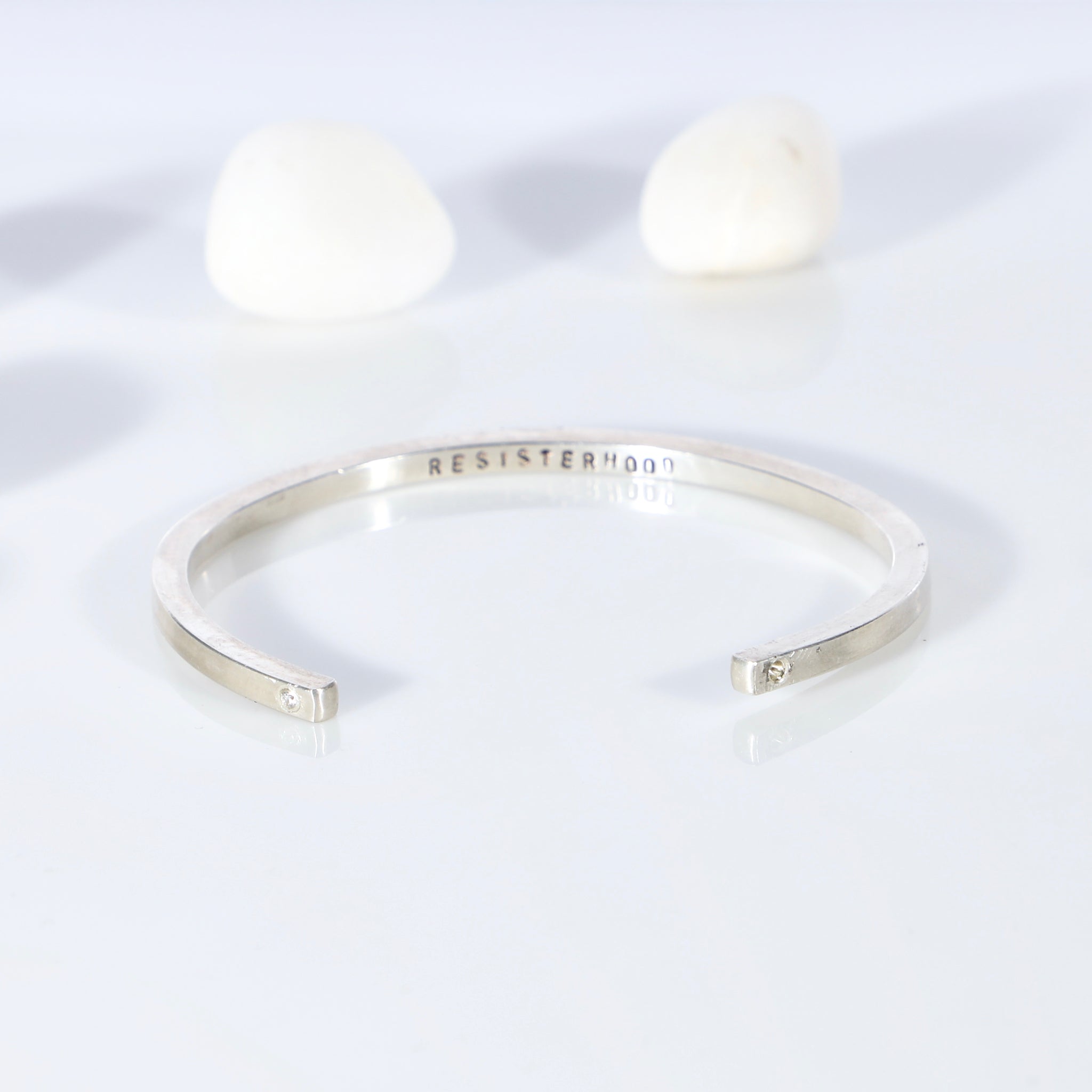 Sterling silver open bangle with diamonds