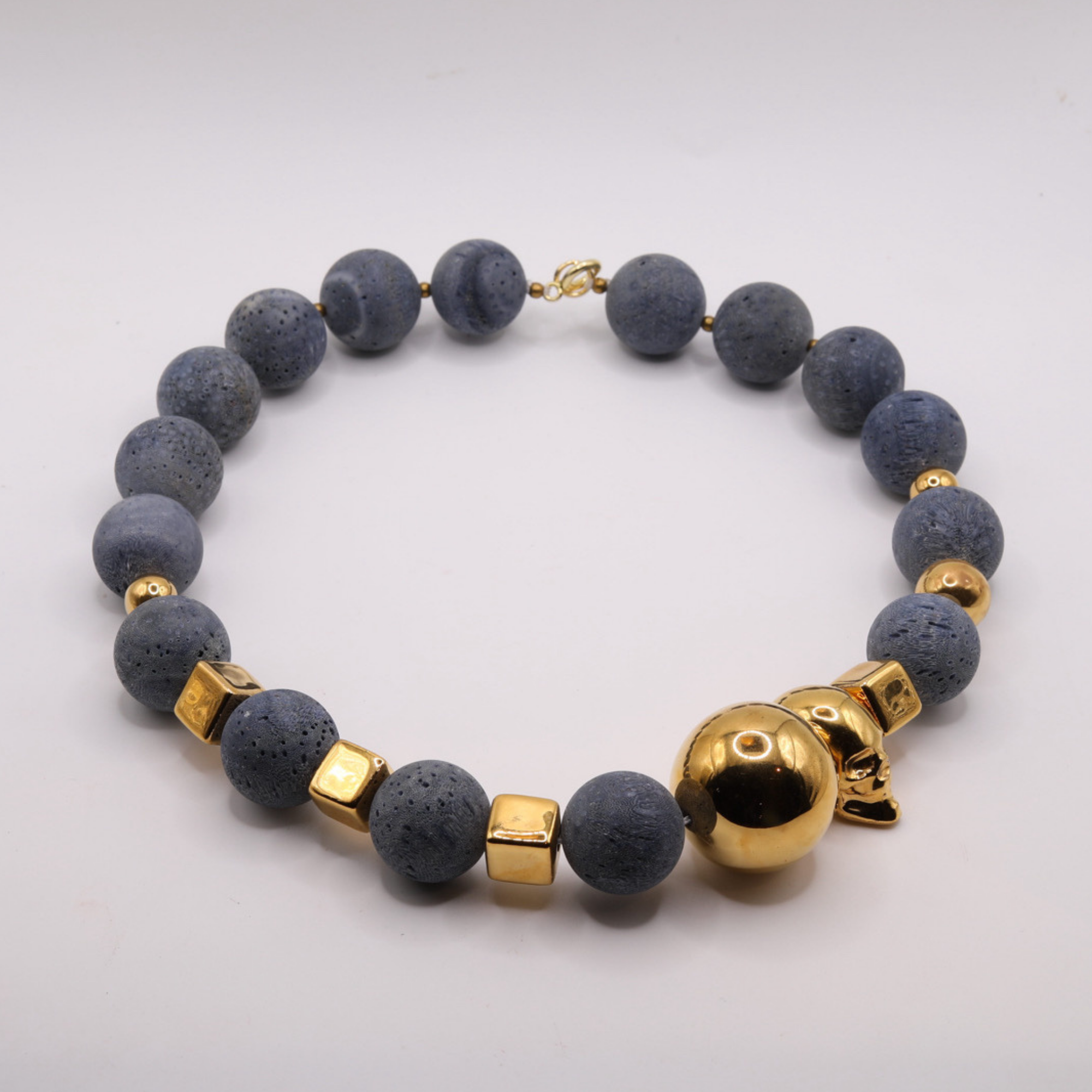 Gold-plated Skull with Blue Coral Necklace