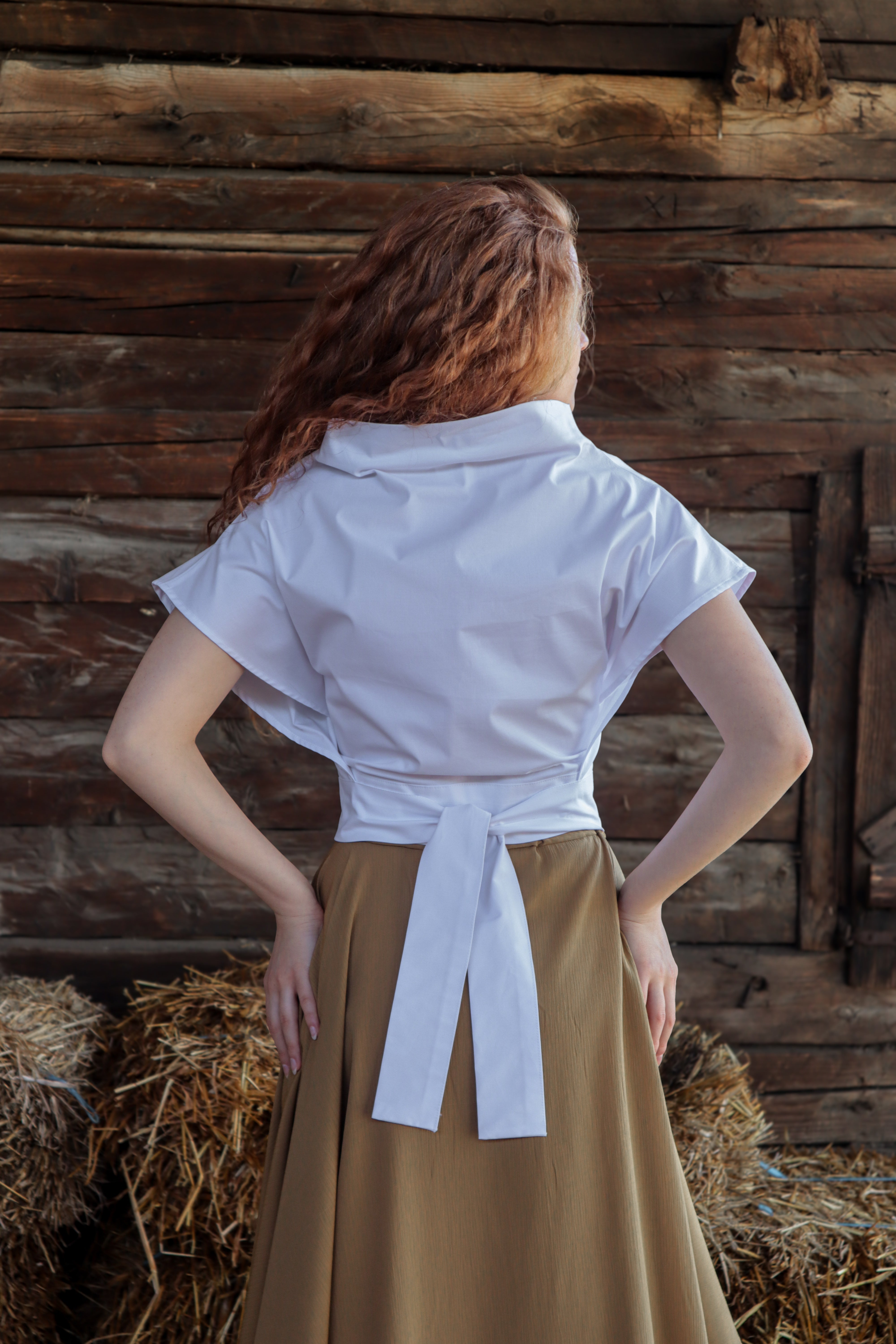 Geometric Wrap Top with a High Collar