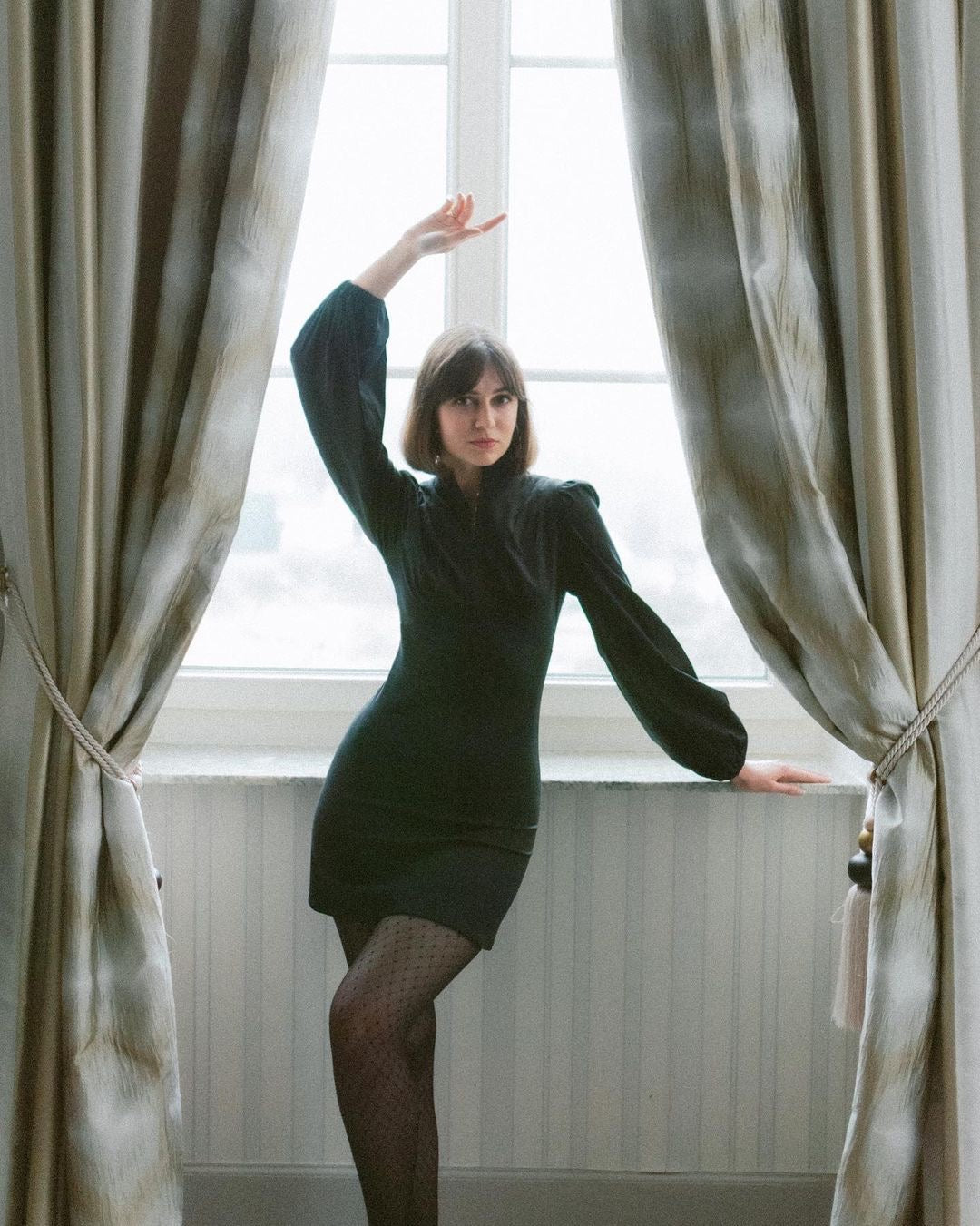 Jane High Neck Empire Mini Dress with Hook and Eye Detail and Blouson Sleeves / Black Cotton