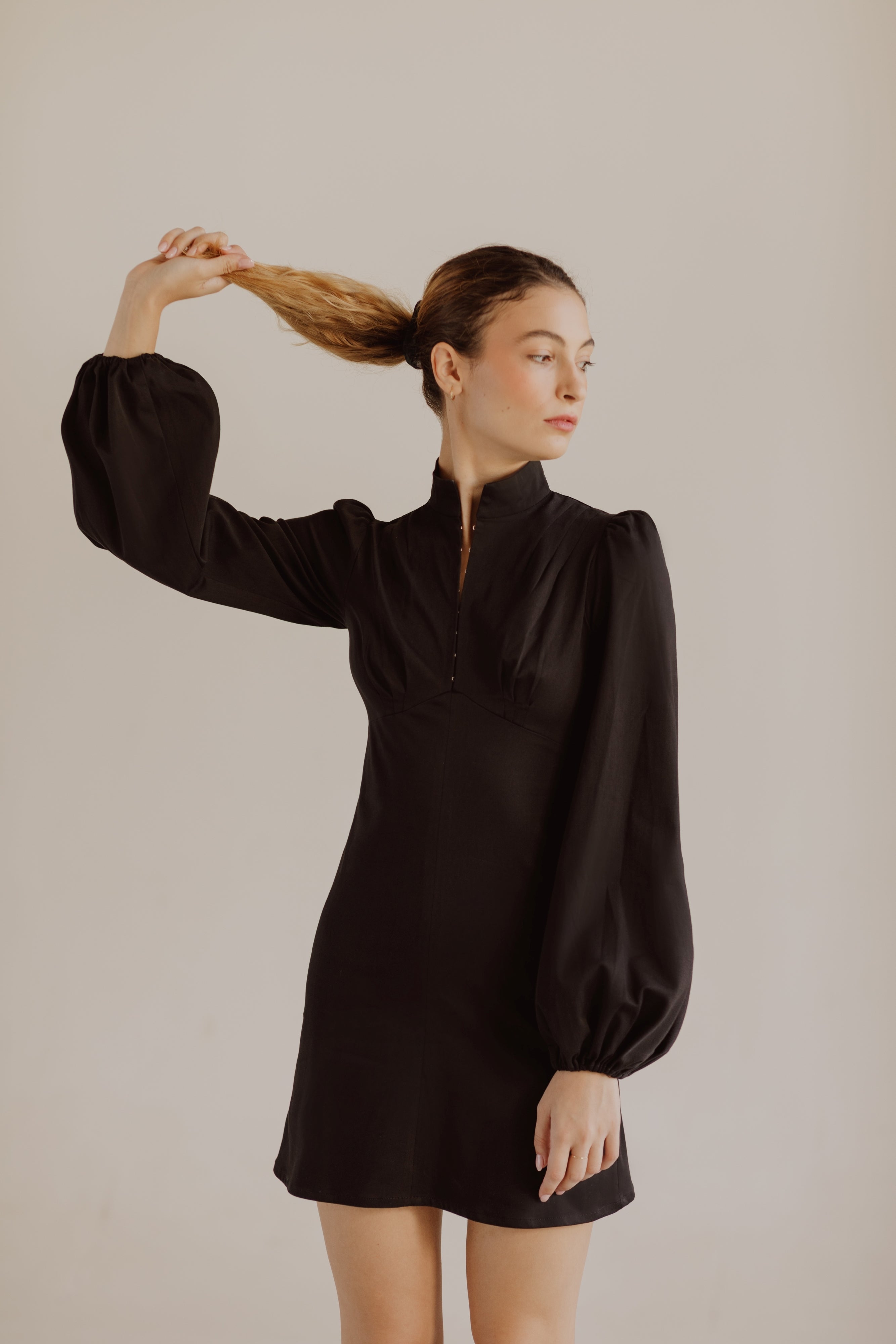 Jane High Neck Empire Mini Dress with Hook and Eye Detail and Blouson Sleeves / Black Cotton