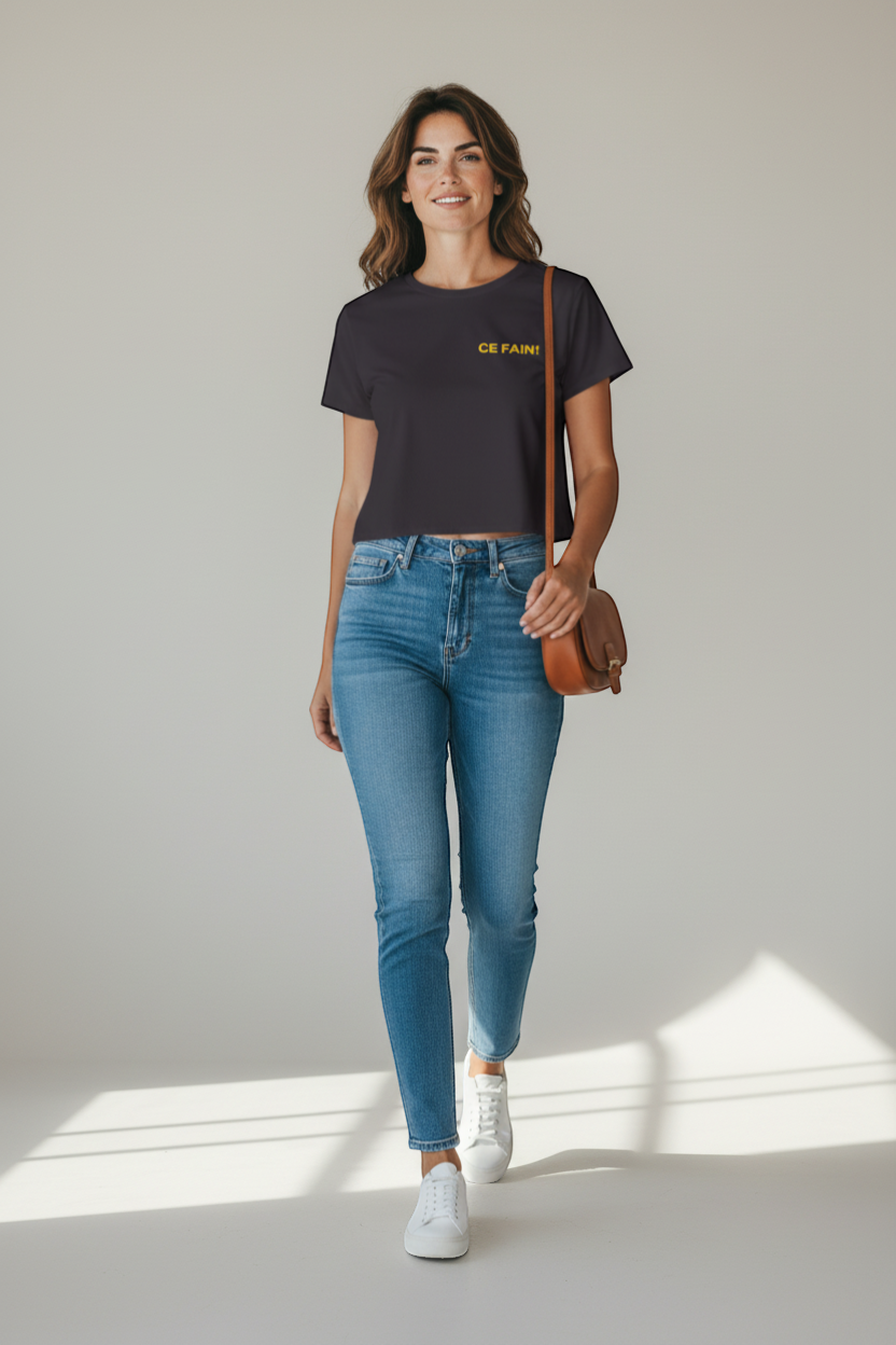 Ce Fain! women's dark grey polyester-cotton blend crop top with scoop neck and raw hems. Features yellow text on front.