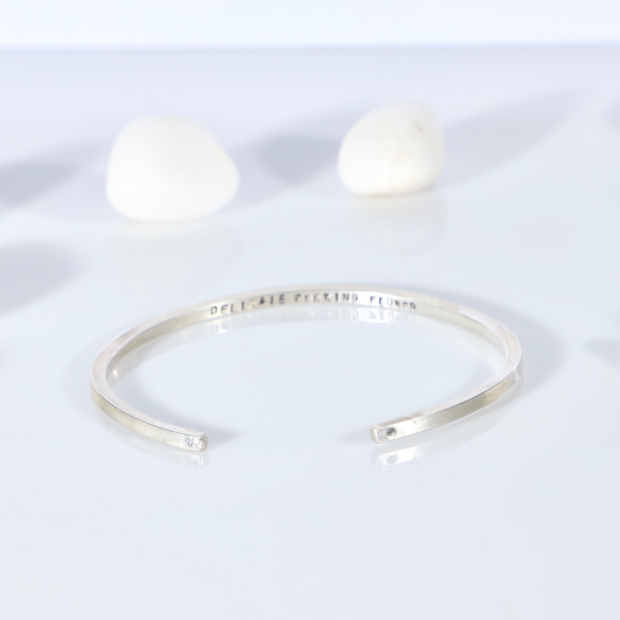 Sterling silver open bangle with diamonds