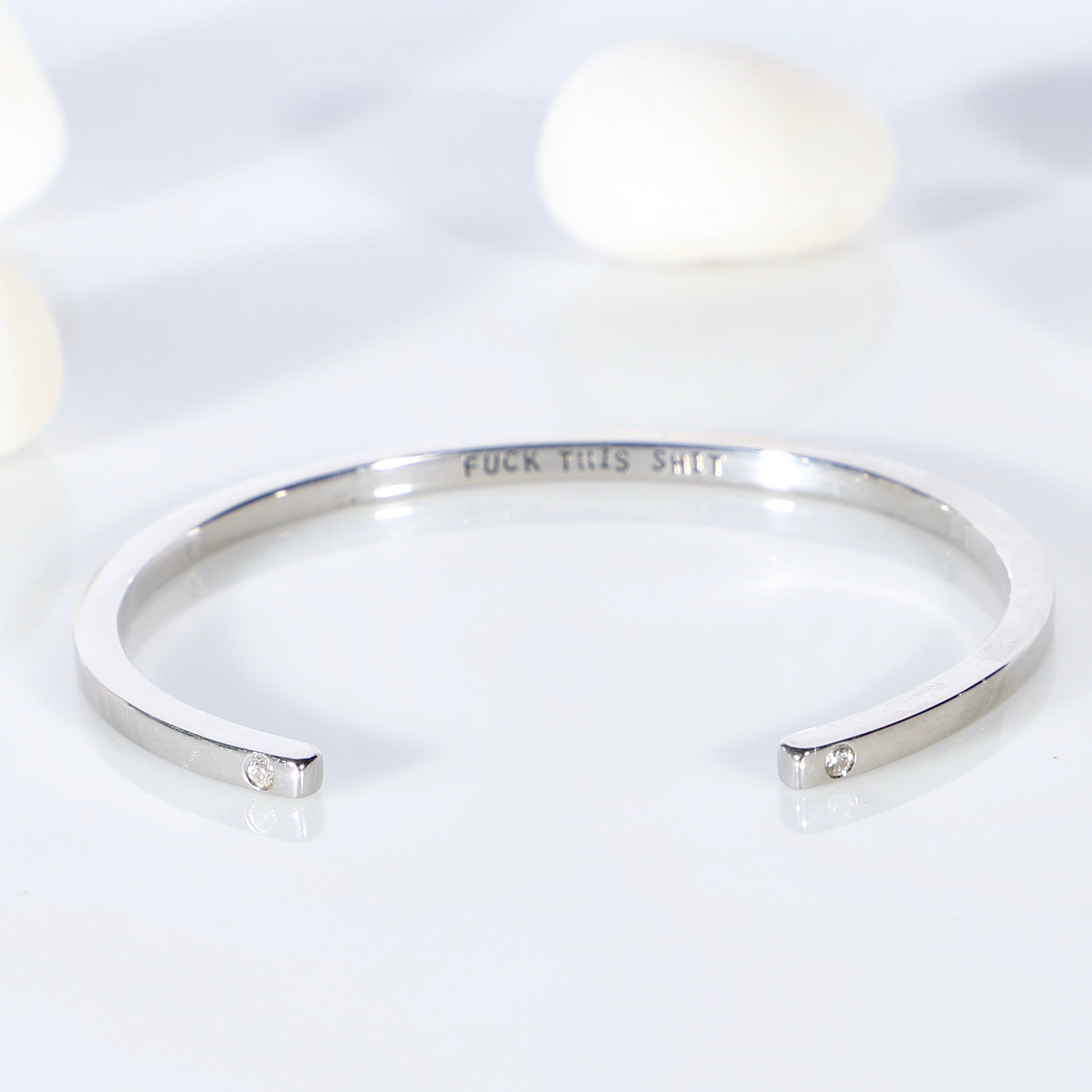 Sterling silver open bangle with diamonds
