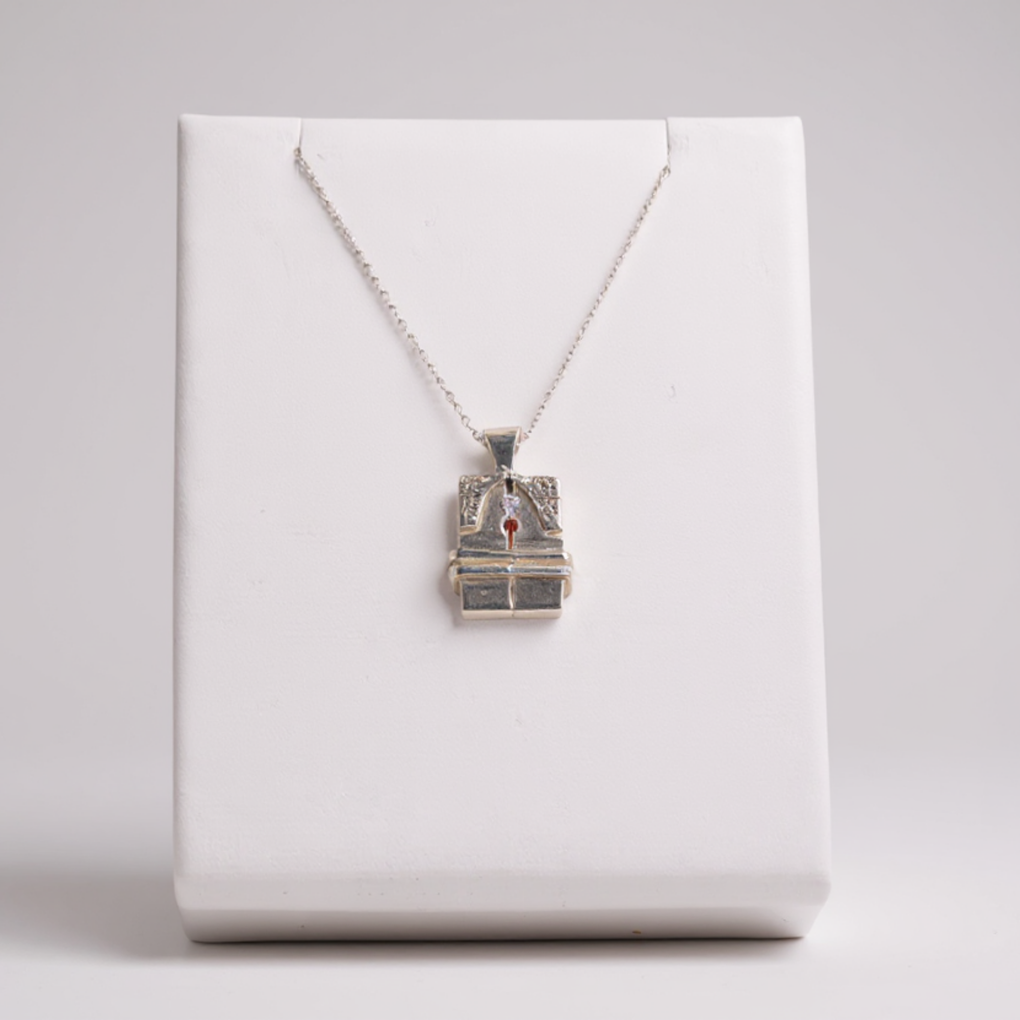 Brancusi The Kiss Pendant – Ruby & CZ