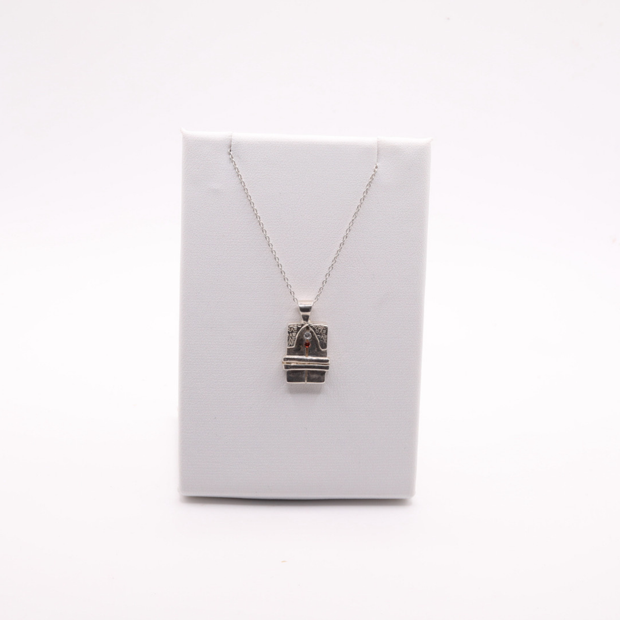 Brancusi The Kiss Pendant – Ruby & CZ