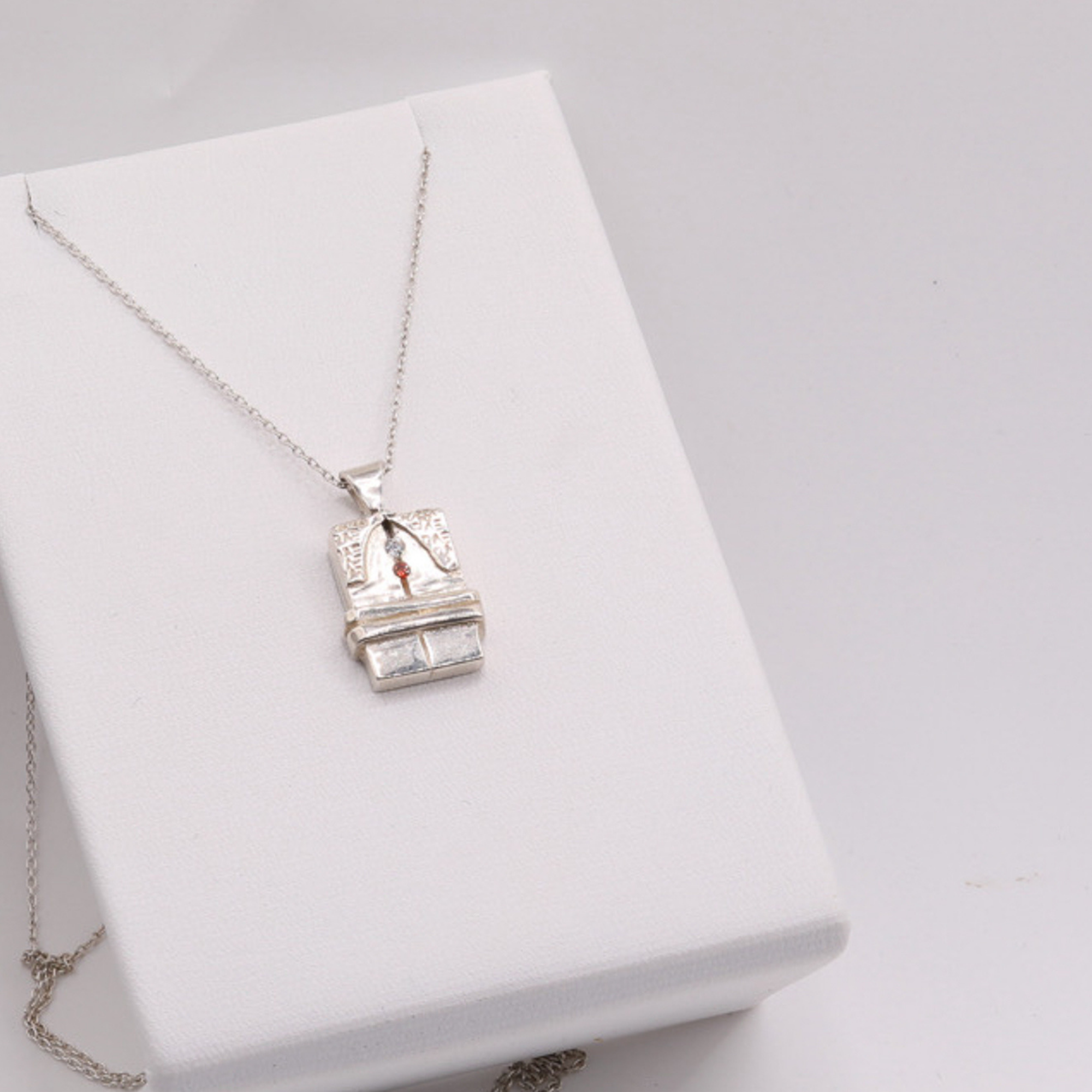 Brancusi The Kiss Pendant – Ruby & CZ