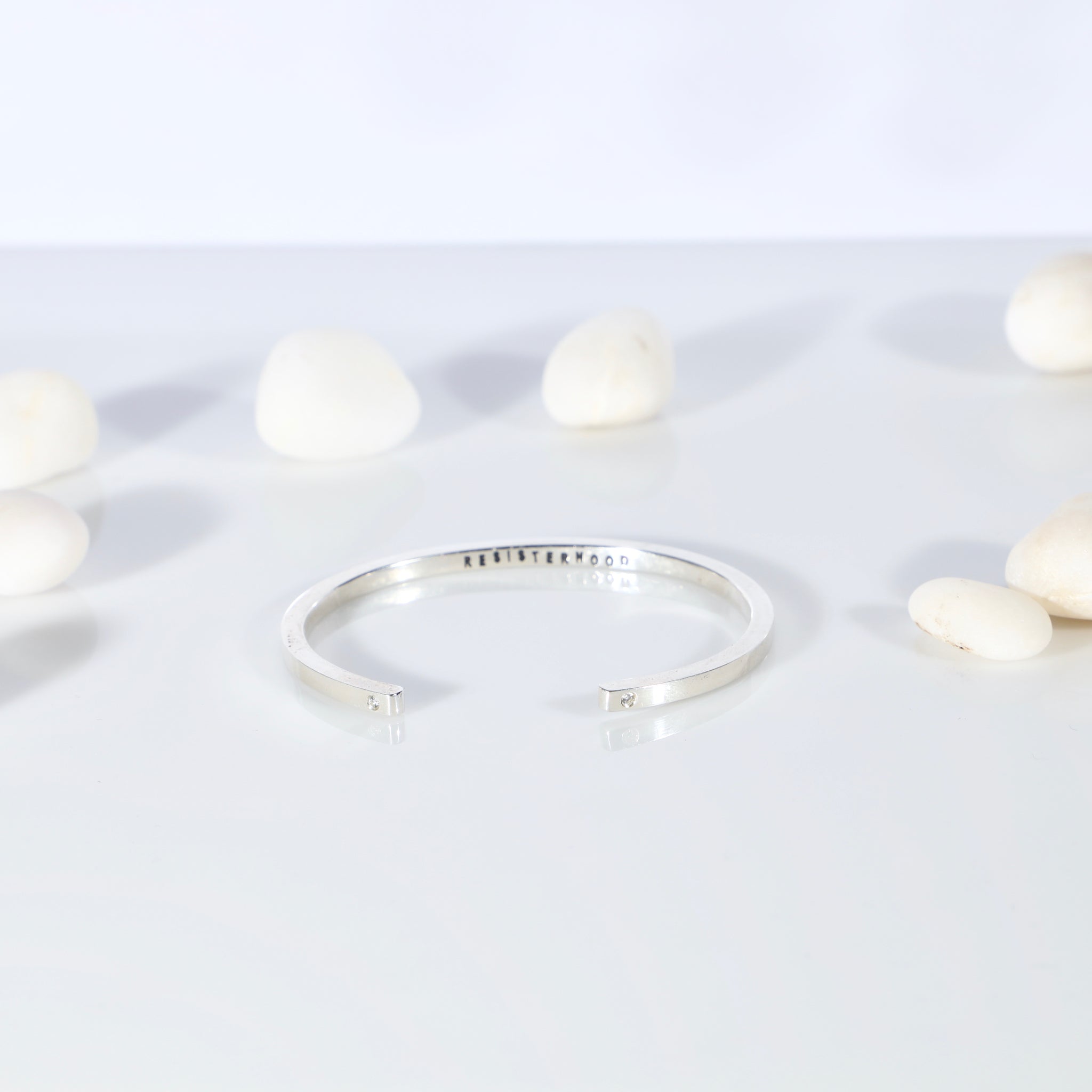 Sterling silver open bangle with diamonds