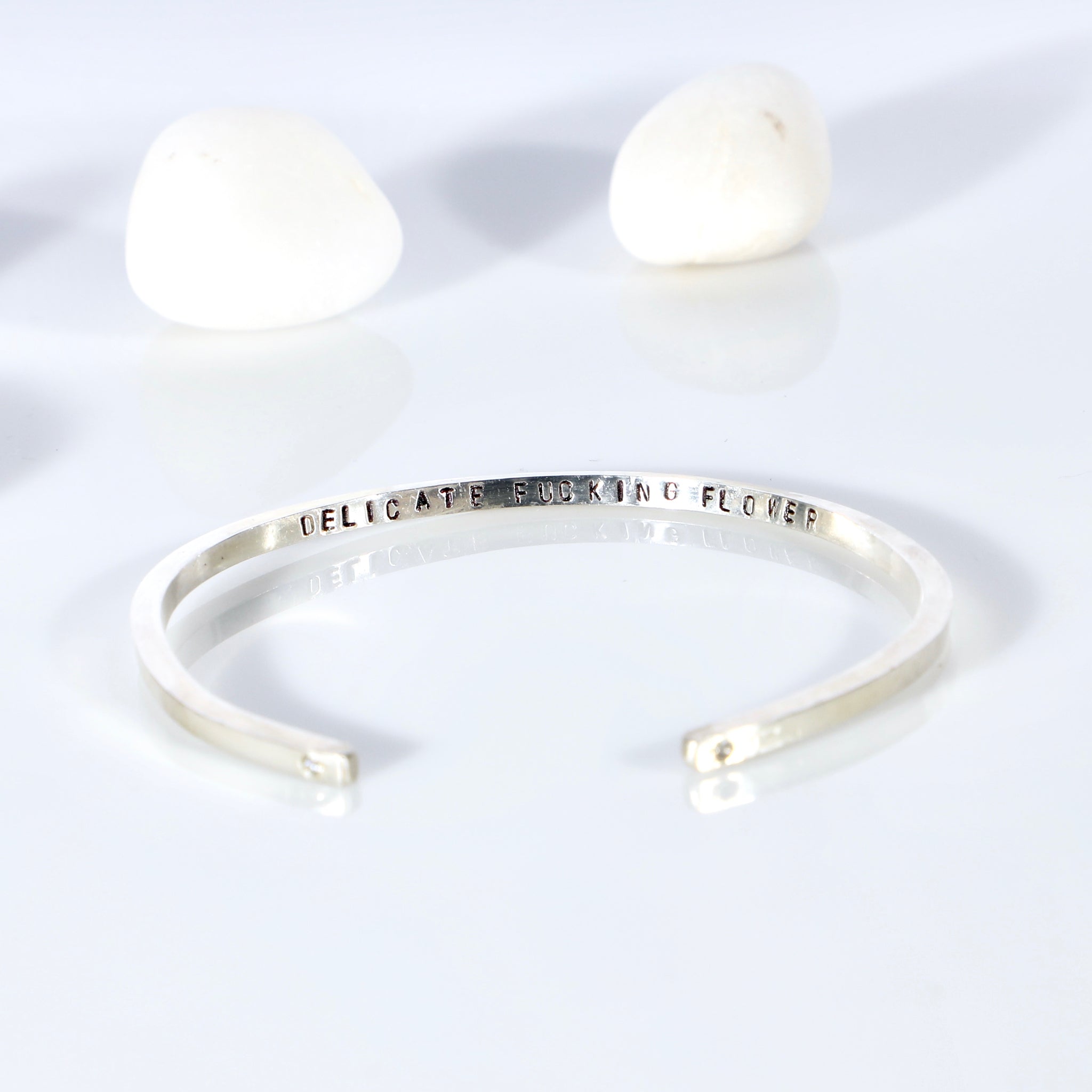 Sterling silver open bangle with diamonds
