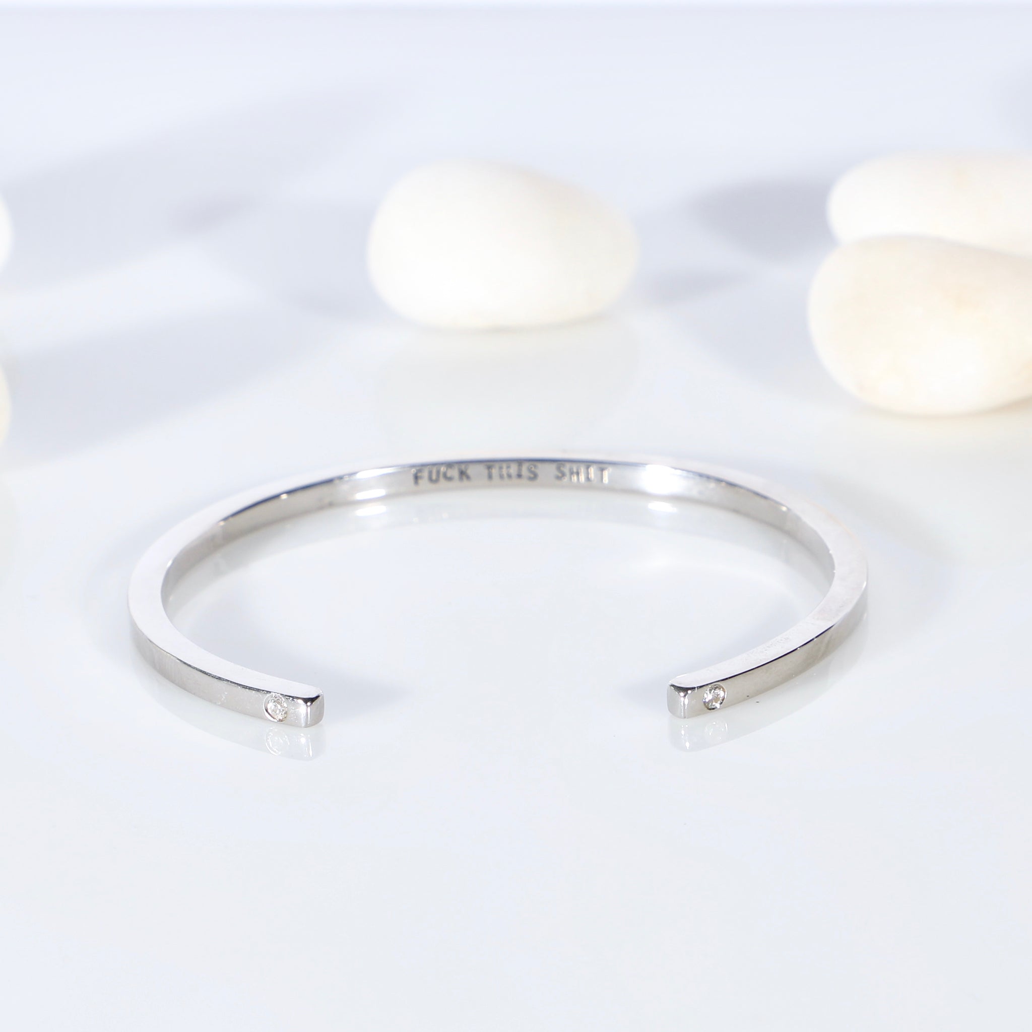 Sterling silver open bangle with diamonds