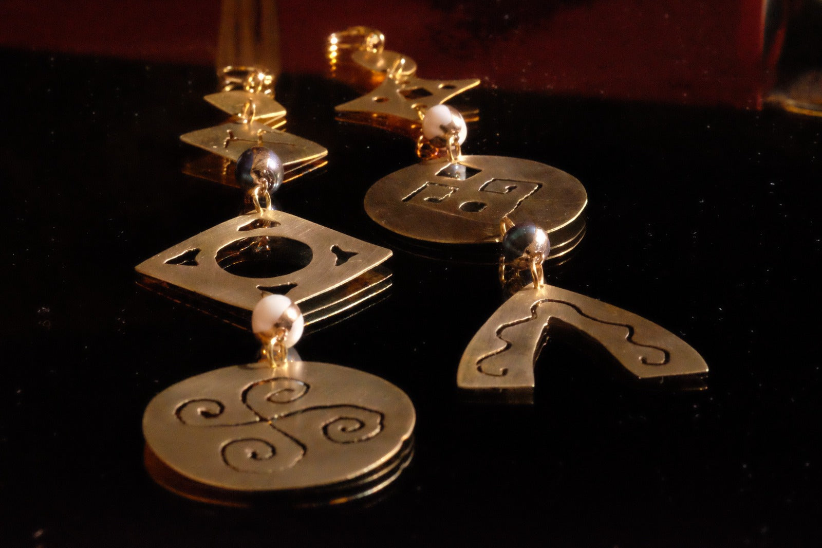 Brass earrings with hyperborean symbols