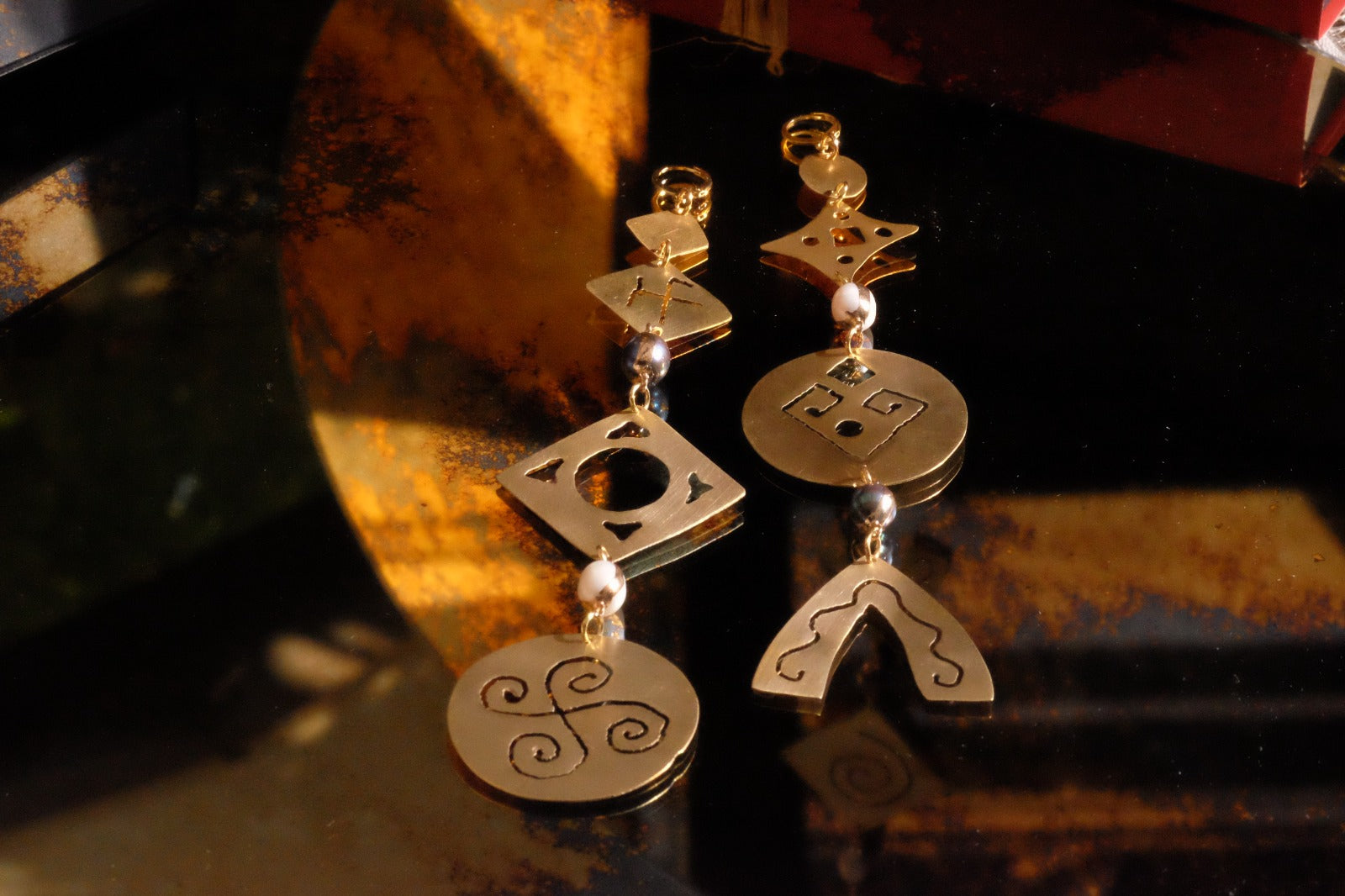 Brass earrings with hyperborean symbols