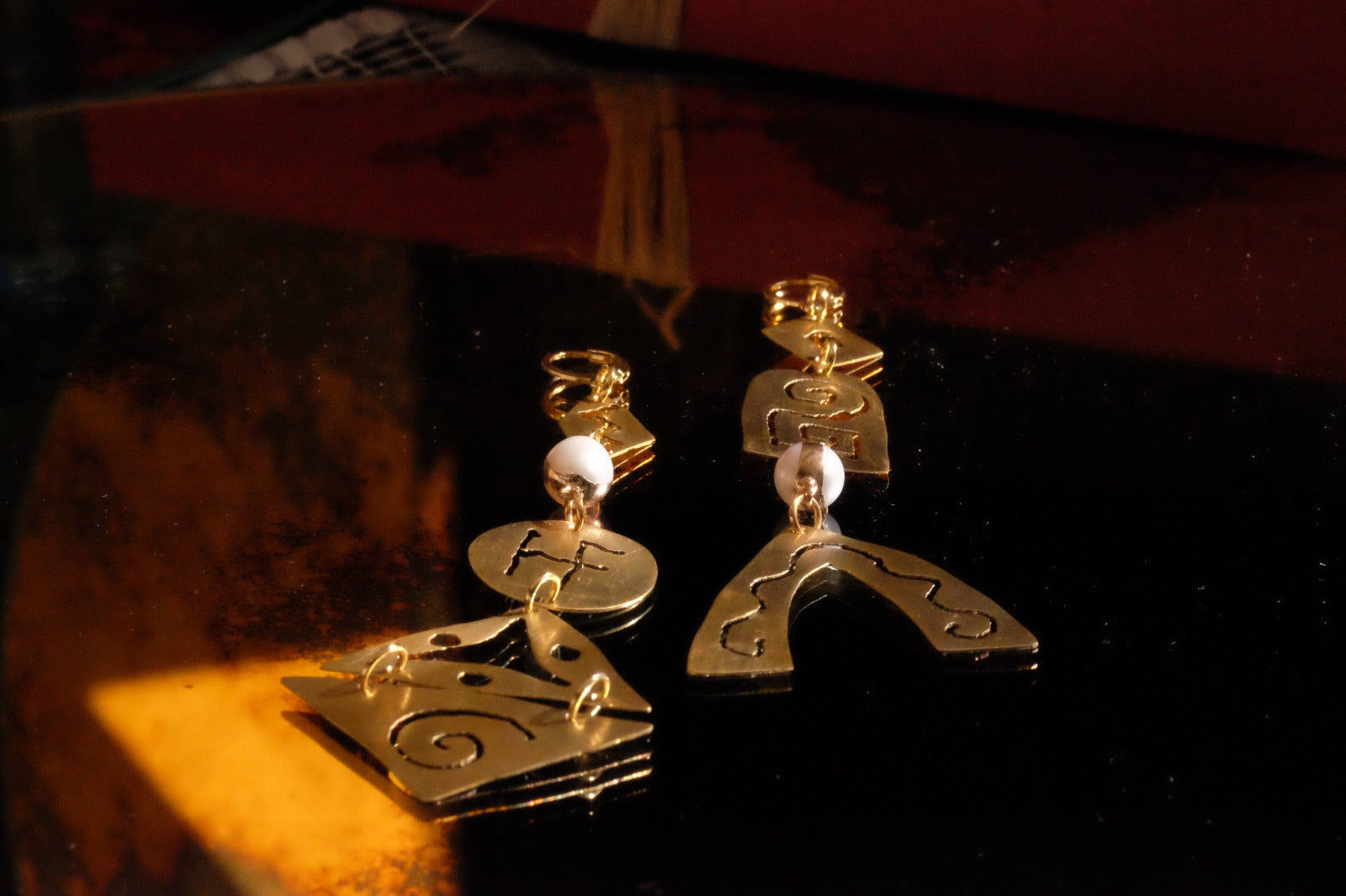 Brass earrings with hyperborean symbols