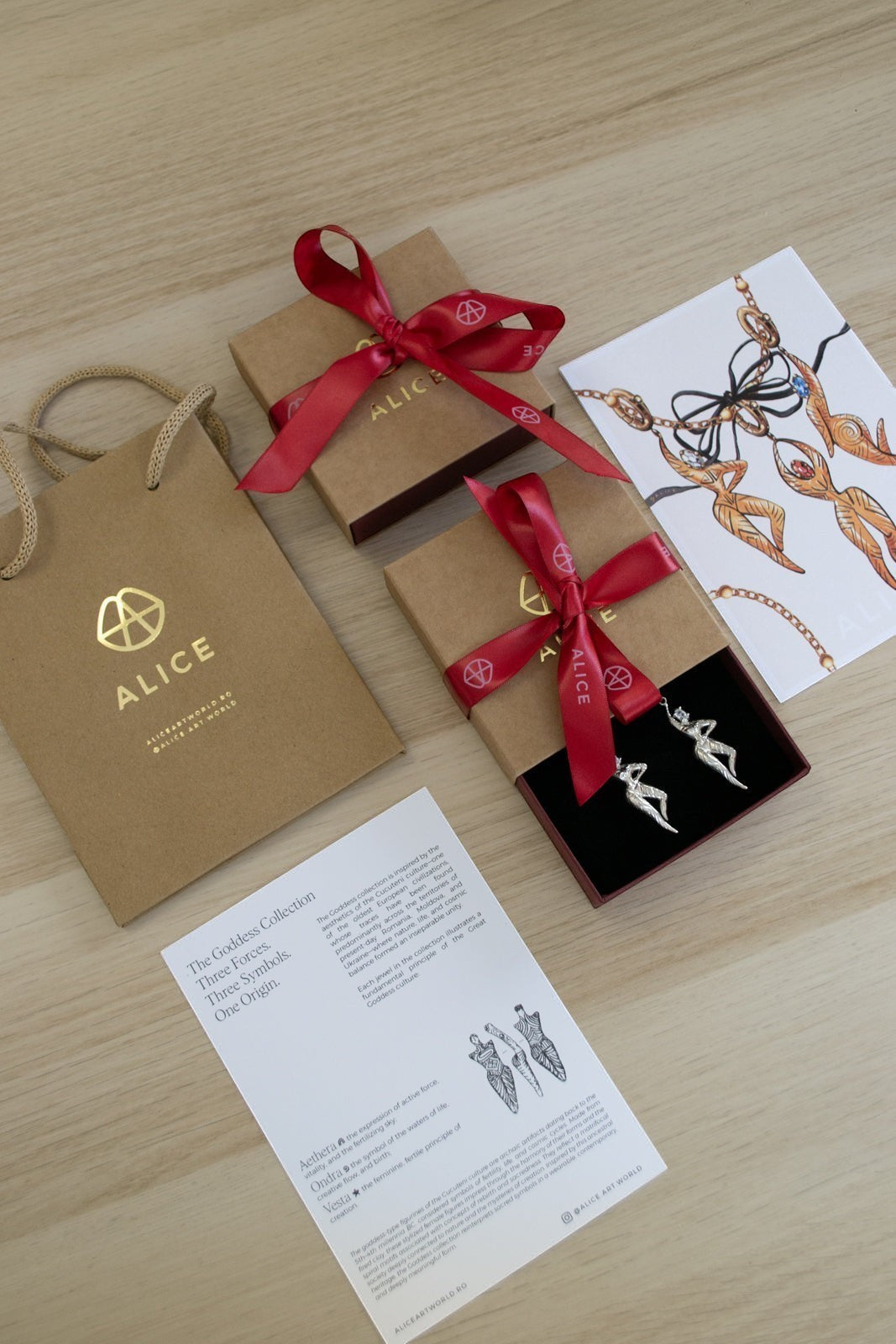 Ce Fain! Aethera sterling silver goddess earrings in a gift box with red ribbon, branded shopping bag, and collection card.