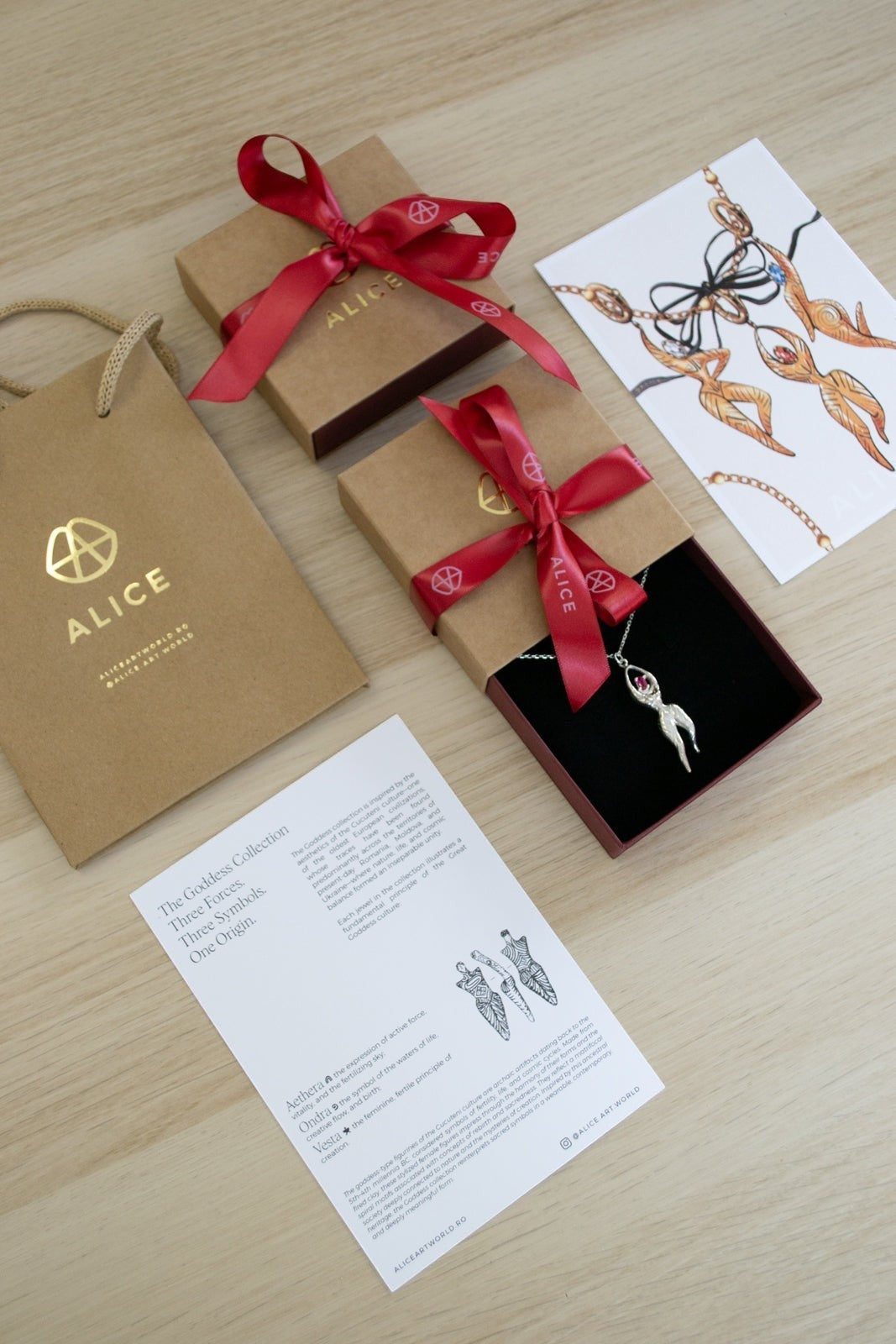Ce Fain! Vesta sterling silver goddess pendant with a red stone, presented in a gift box with a red ribbon and card.