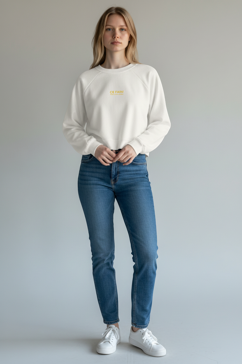 Ce Fain! women's white cropped fleece pullover with raglan sleeves and subtle vintage graphic detail.