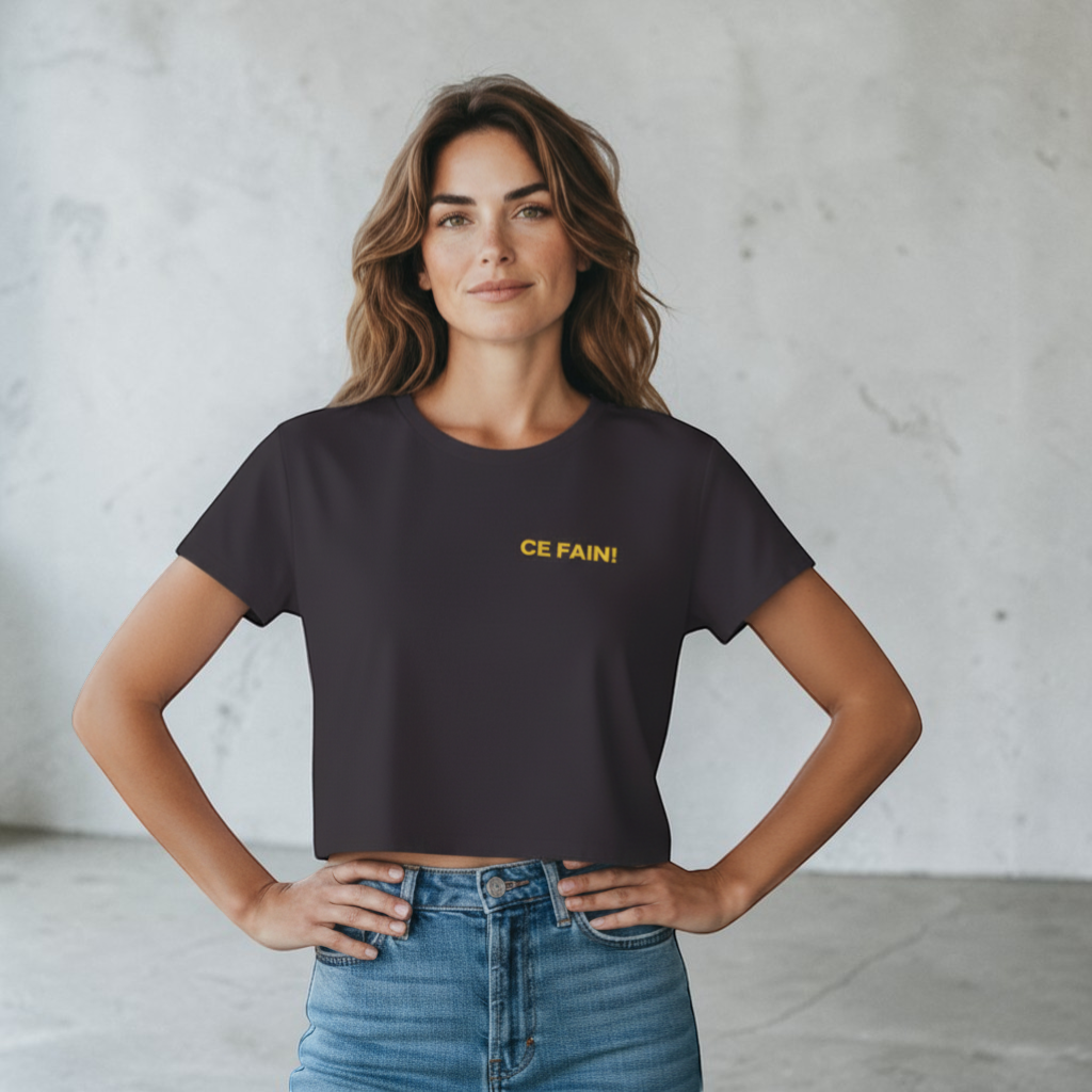 Ce Fain! women's dark grey polyester-cotton blend crop top with scoop neck and raw hems, featuring yellow text on front.