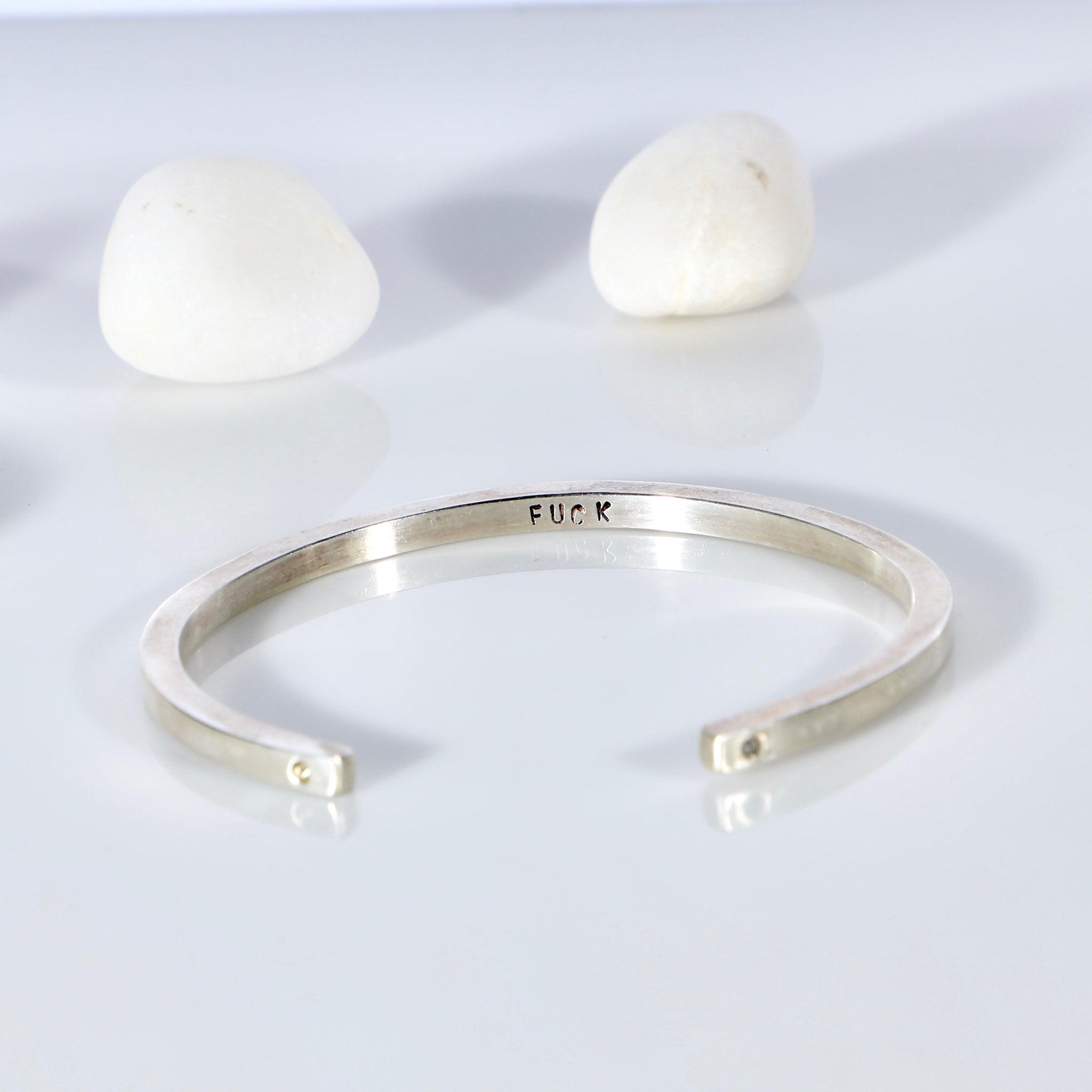 Sterling silver open bangle with diamonds