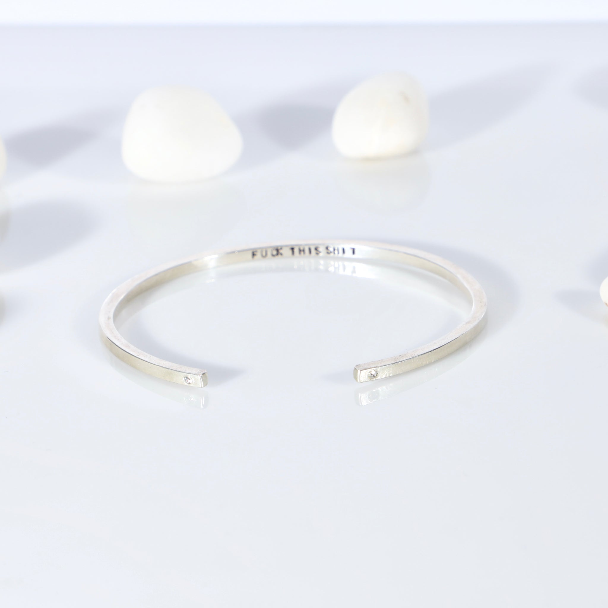 Sterling silver open bangle with diamonds