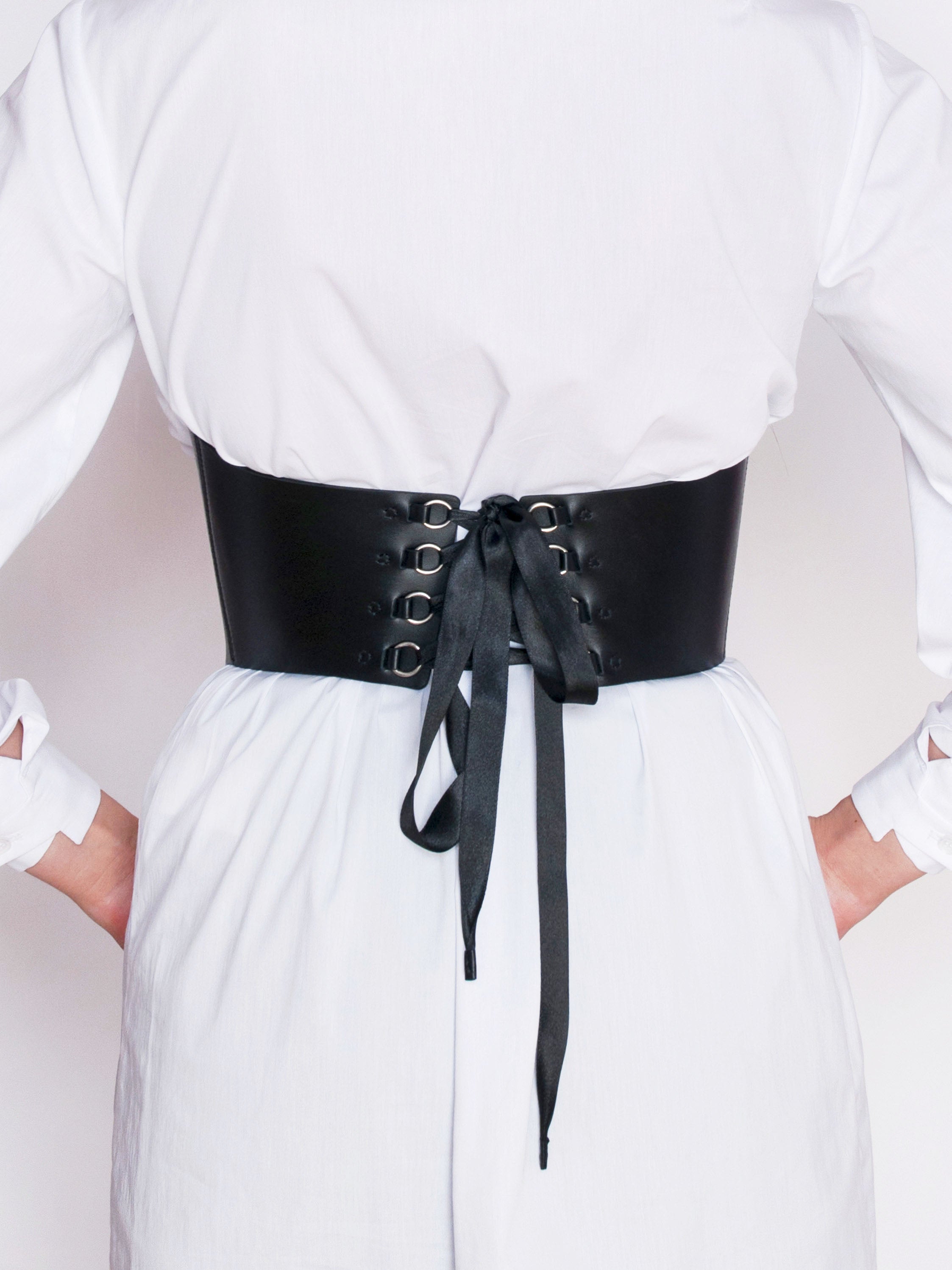 Back view of lace up underbust corset.