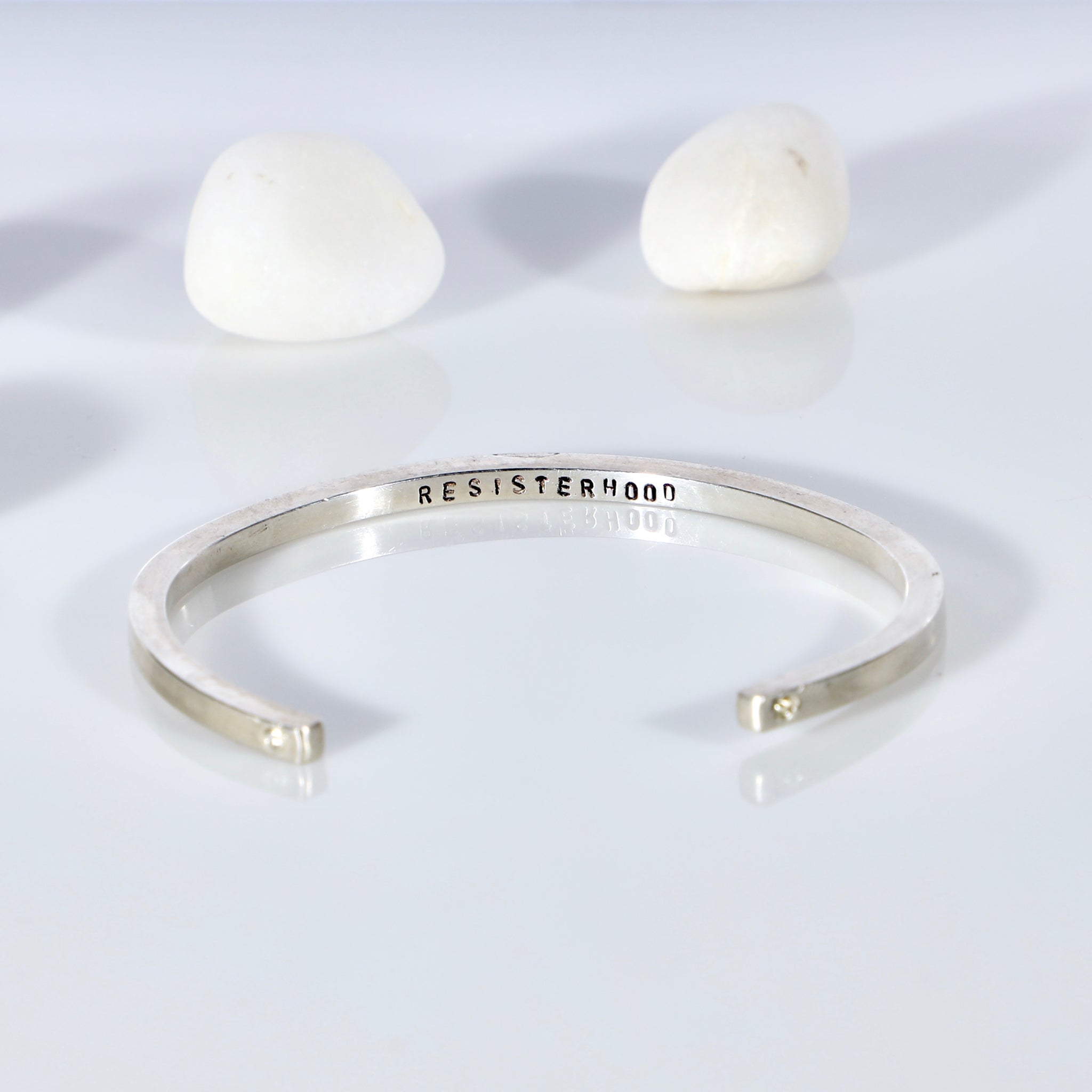 Sterling silver open bangle with diamonds